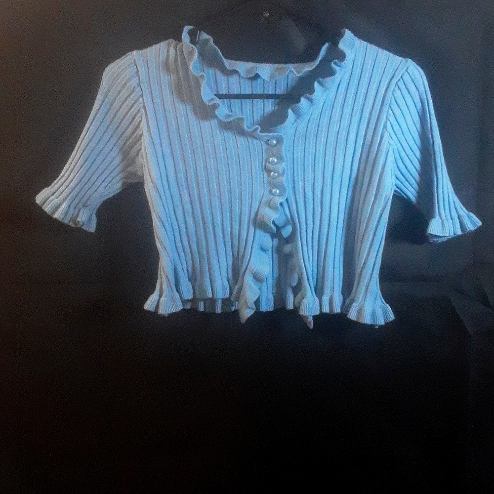 Blue ruffle trim cropped sweater